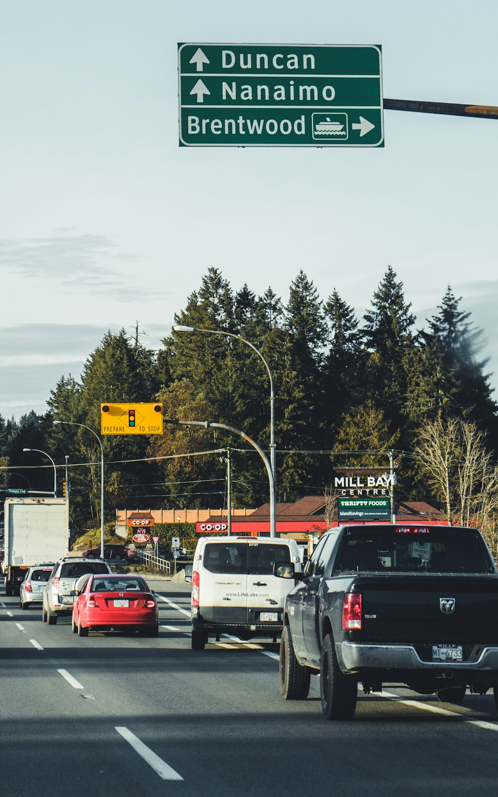 cars parked on parking lot during daytime