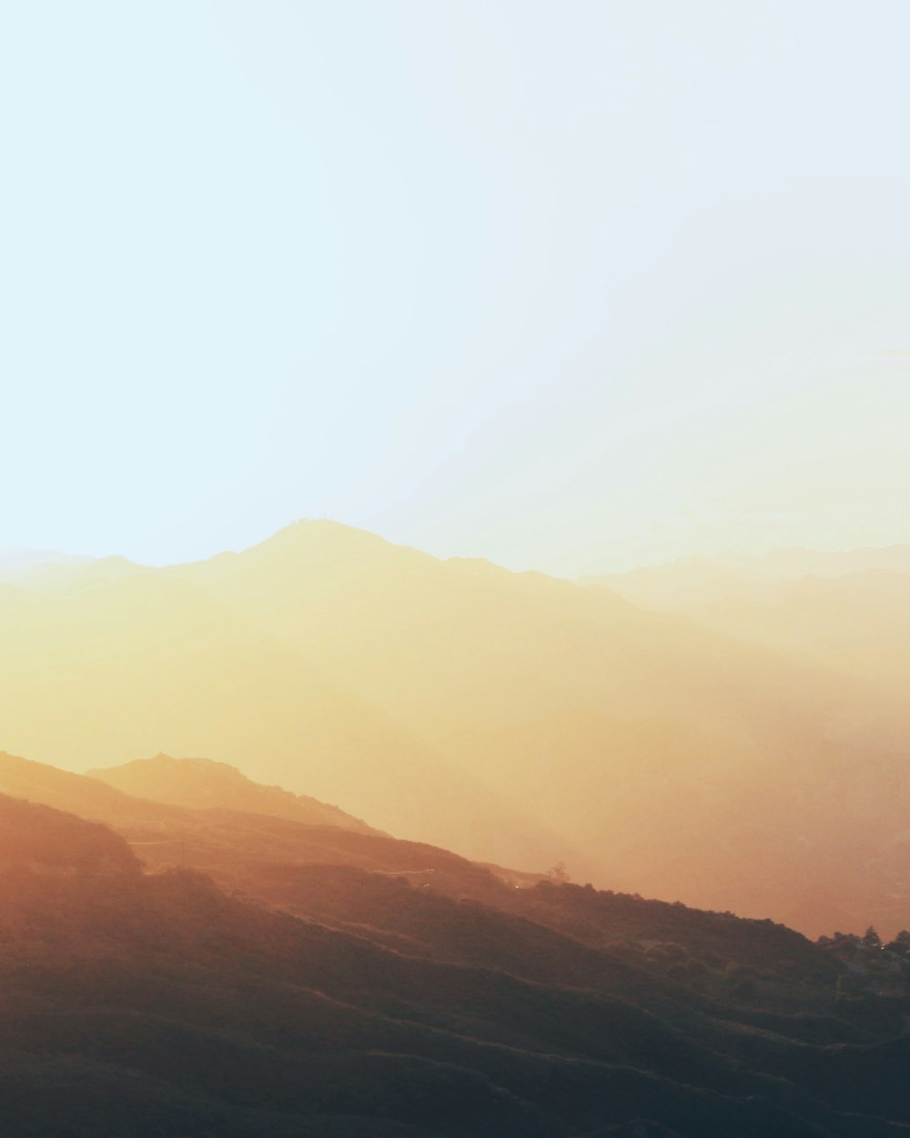 silhouette of mountains during daytime