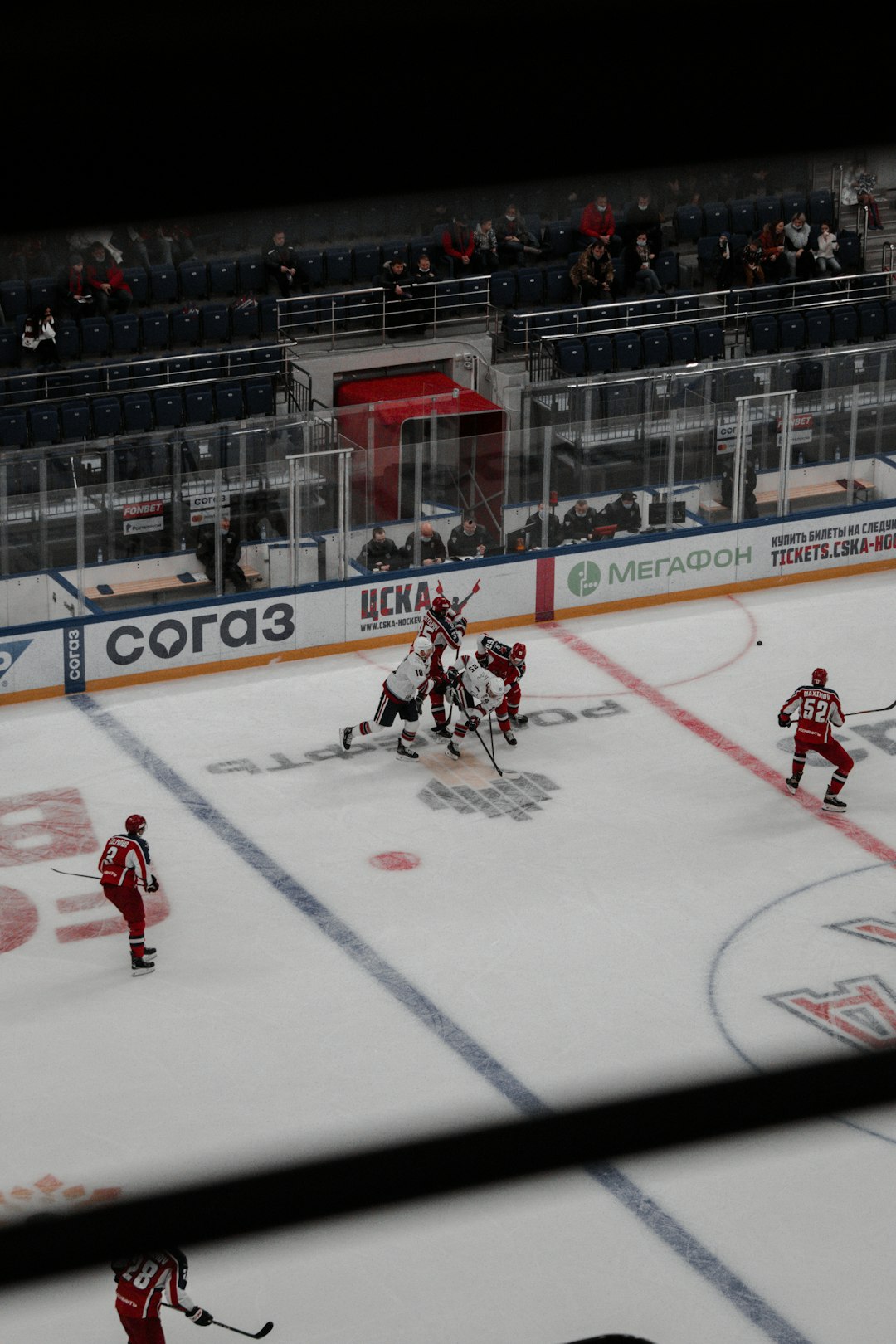 ice hockey players on ice hockey stadium