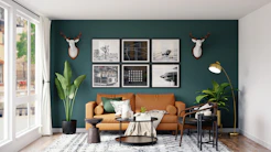 brown wooden framed white padded chairs