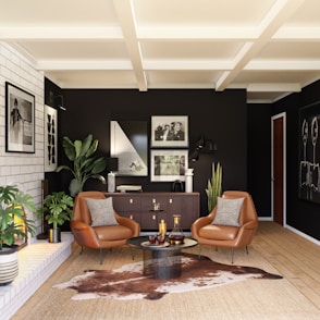 brown wooden round table near green potted plant
