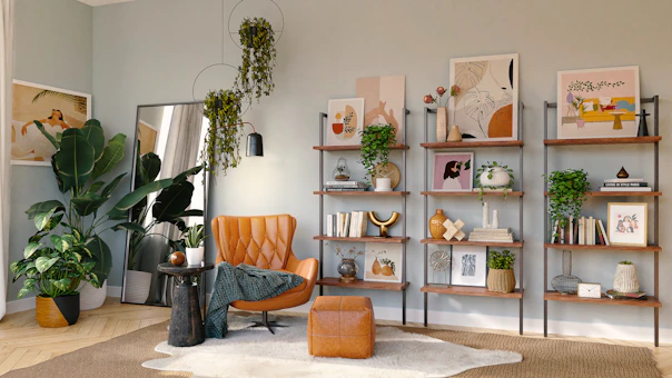 brown and black armchair beside white wooden shelf