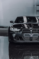 black bmw m 3 on road