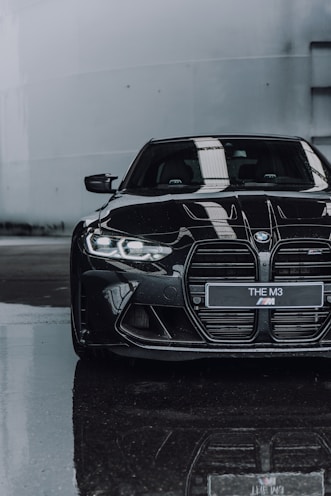 black bmw m 3 on road