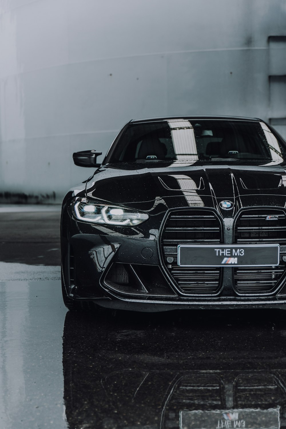 black bmw m 3 on road