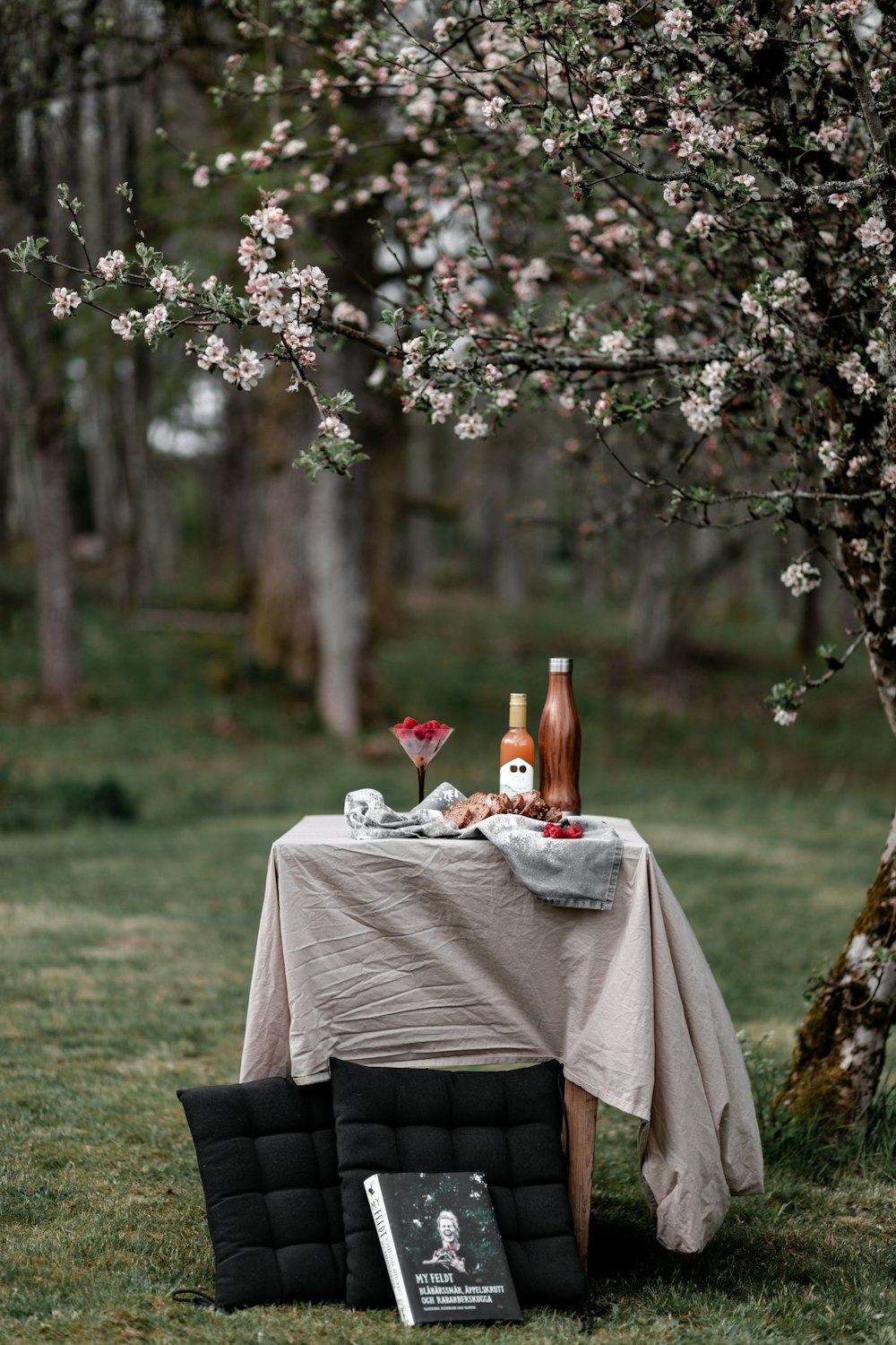 white textile on brown wooden chair