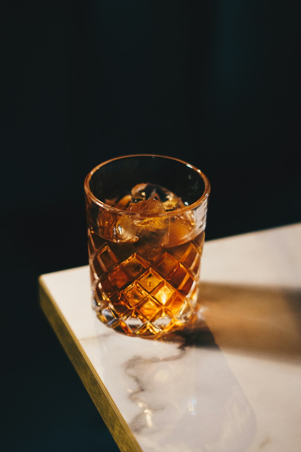 clear drinking glass on white table