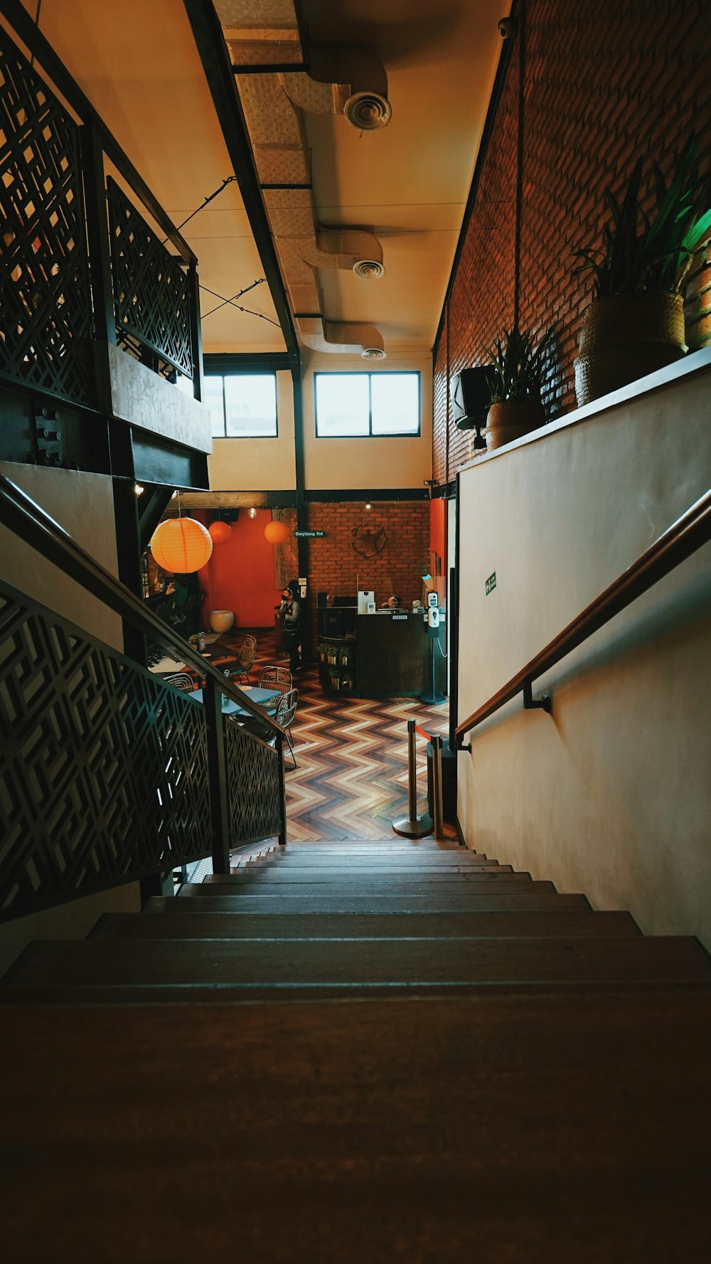 black metal staircase on white concrete building