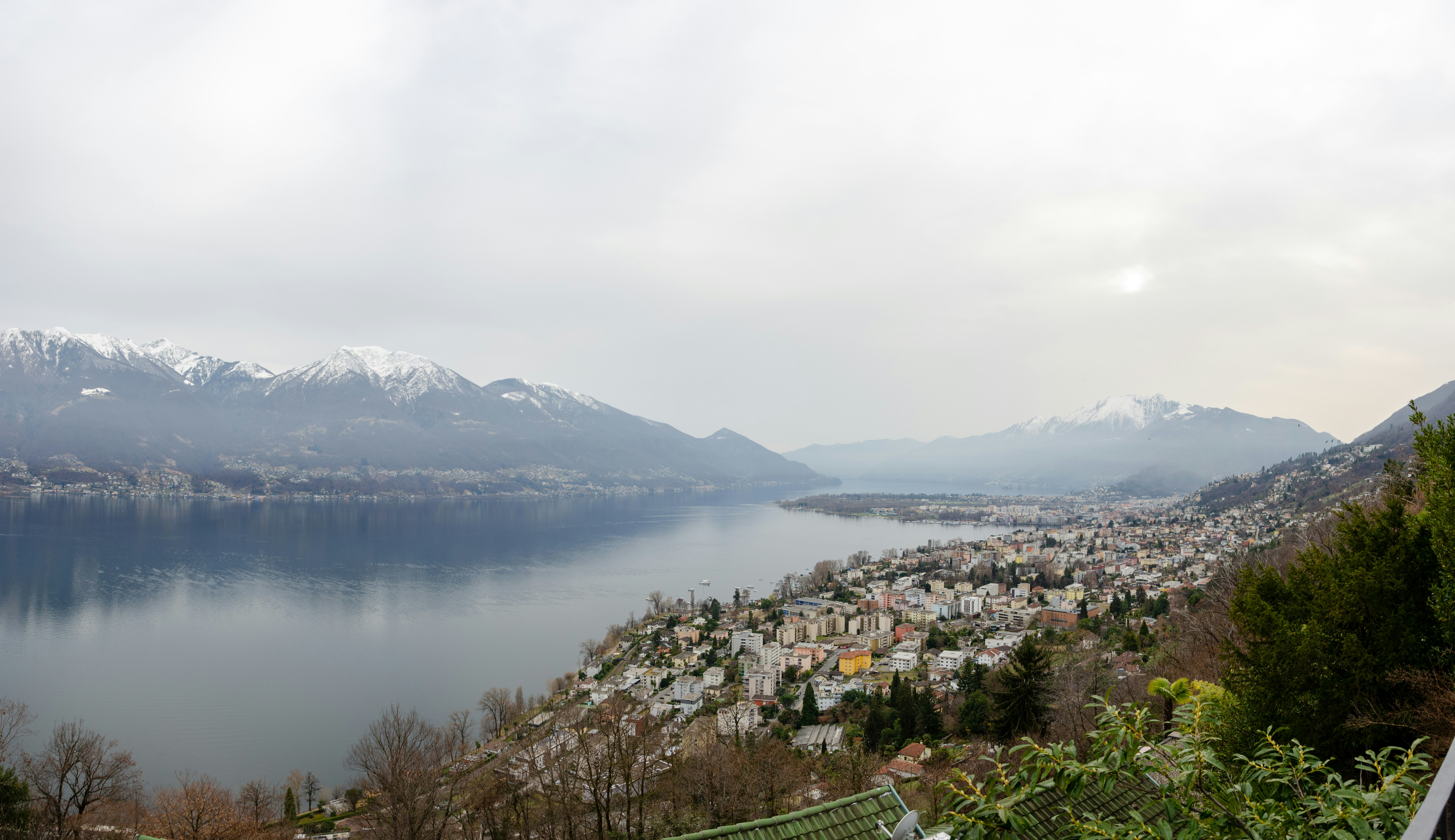 aerial view of city near body of water during daytime
