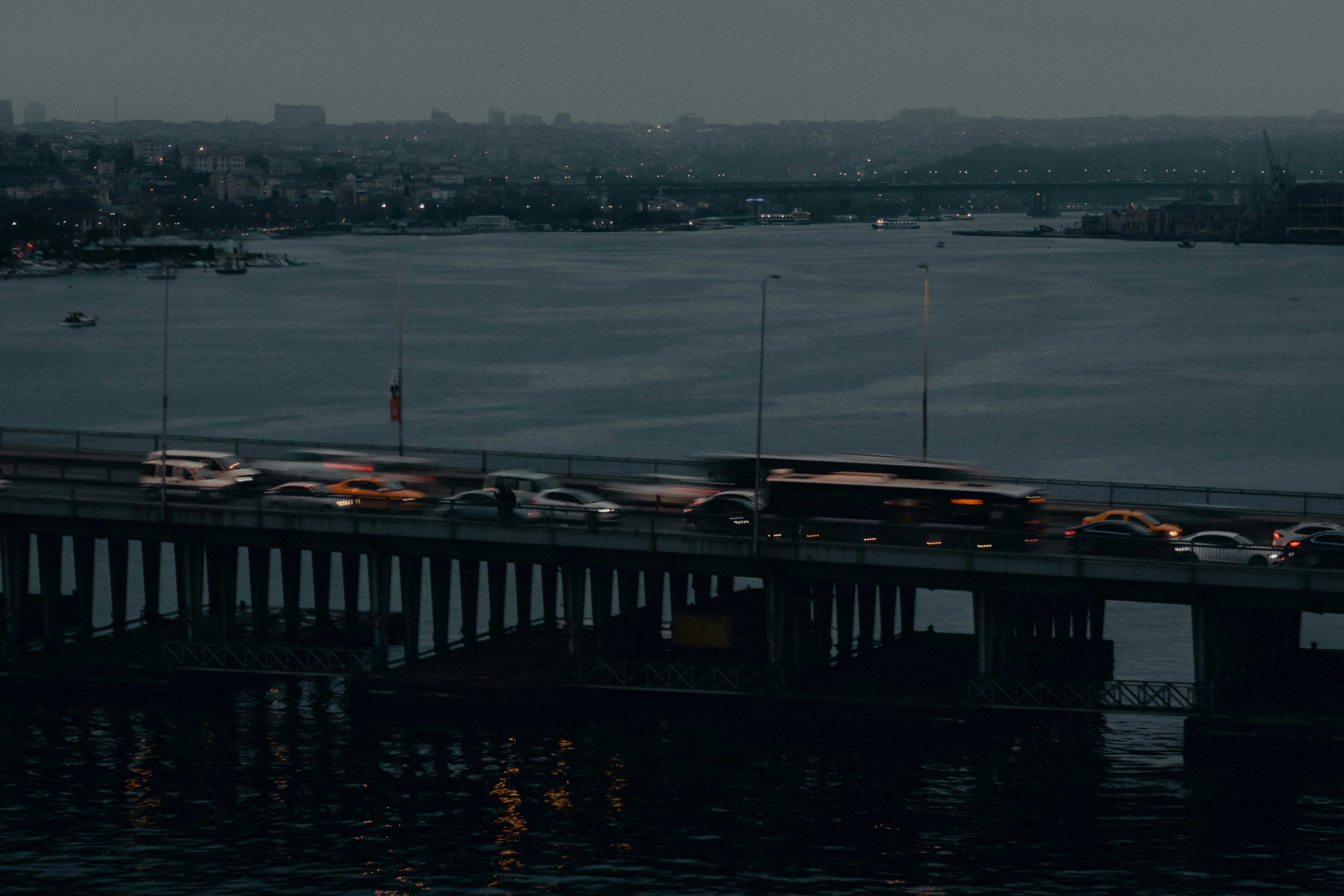 black wooden dock on body of water during daytime