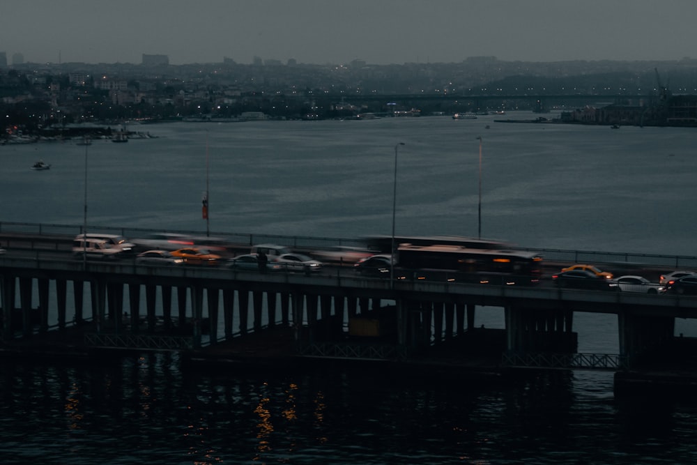 black wooden dock on body of water during daytime