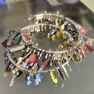 Array of personalized 3D printed keychains with vibrant colors and unique shapes.