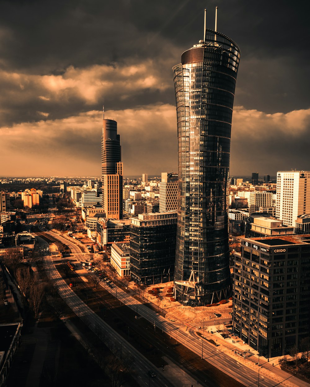 city skyline under gray cloudy sky during daytime