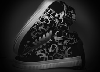 A pair of sturdy canvas sneakers with elephant-inspired patterns on the sides.