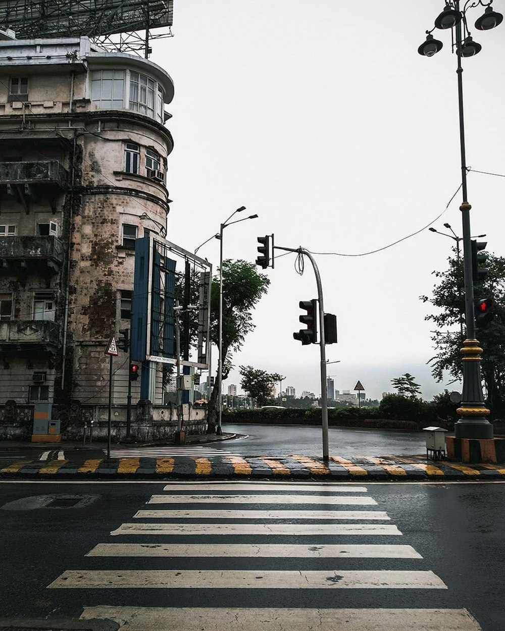 black traffic light on gray concrete road during daytime