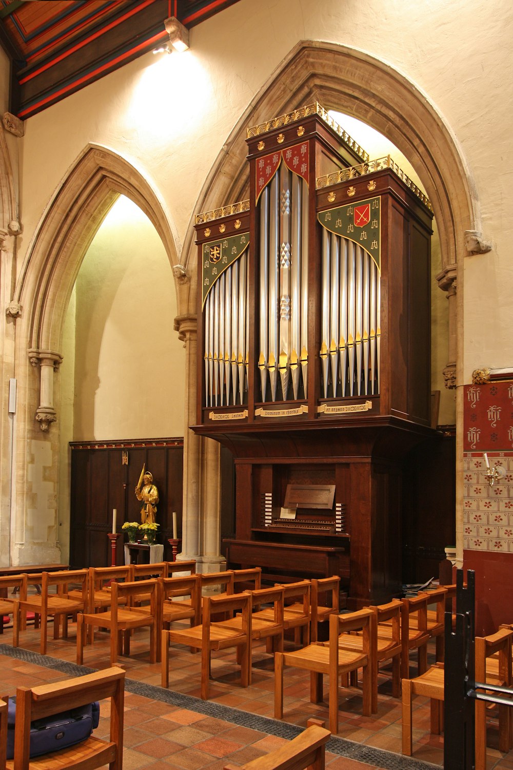 brown wooden chairs inside church