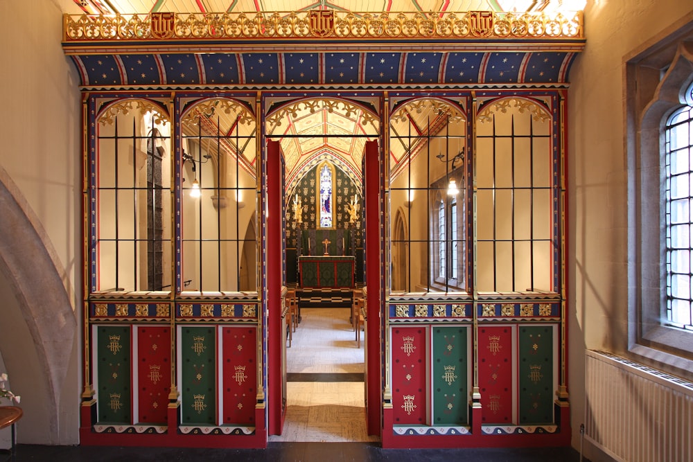 red and gold wooden cabinet