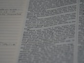 A close-up of handwritten script pages with notes and sketches.