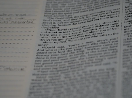 Close-up of an open journal article with handwritten notes on the side