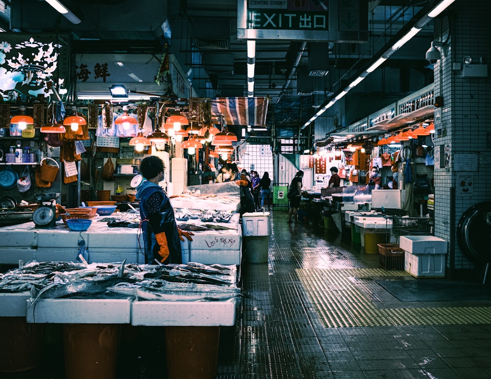 people in market during daytime