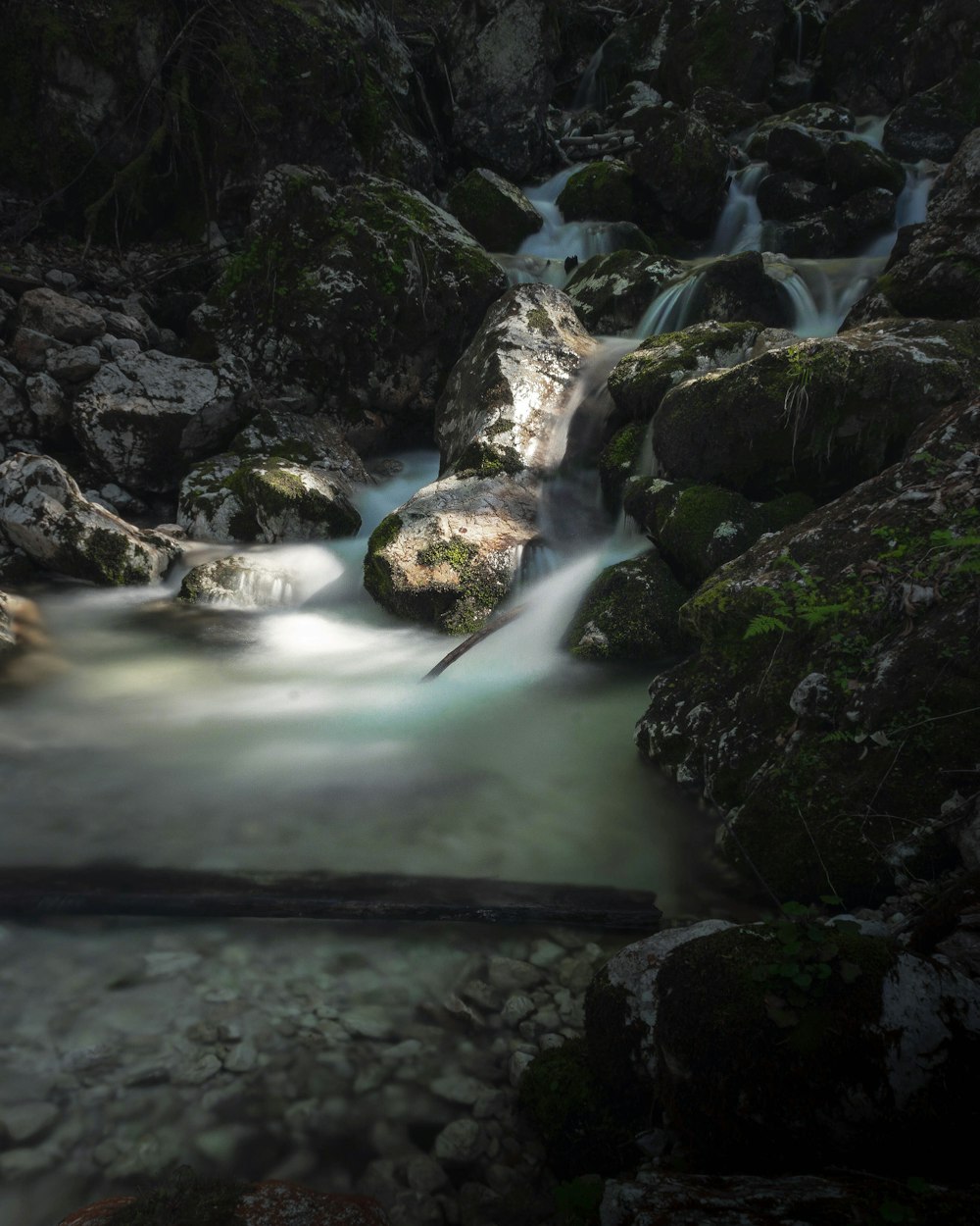 river in the middle of rocks