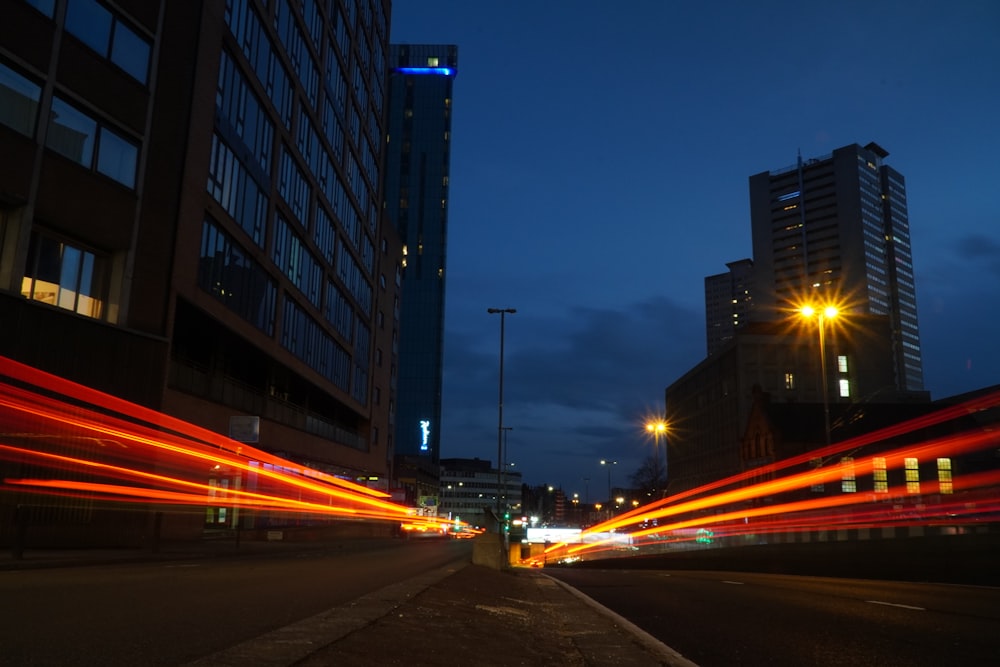 time lapse photography of cars on road during night time