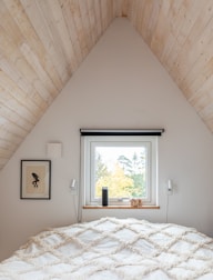 white and brown floral bed linen