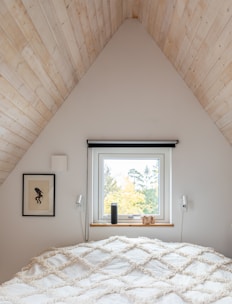 white and brown floral bed linen