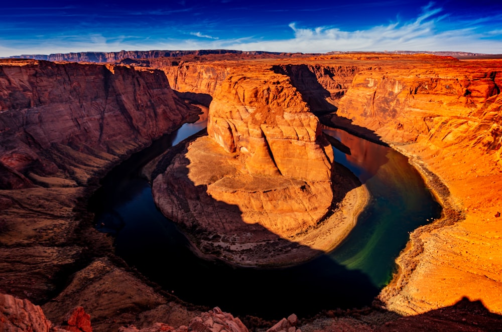 brown rock formation under blue sky during daytime