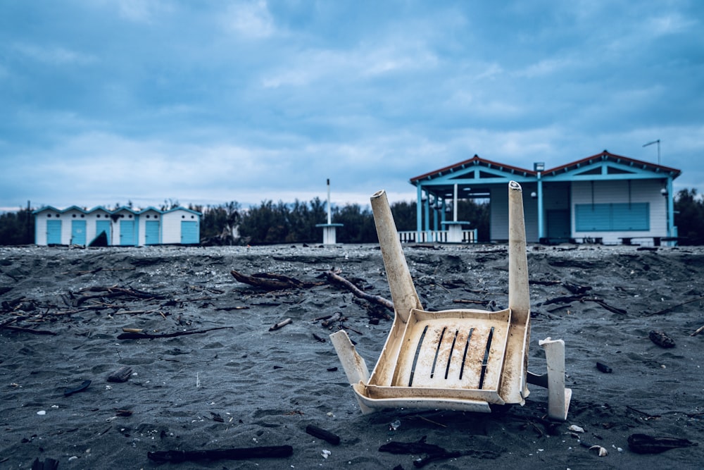 brown wooden bench on beach during daytime