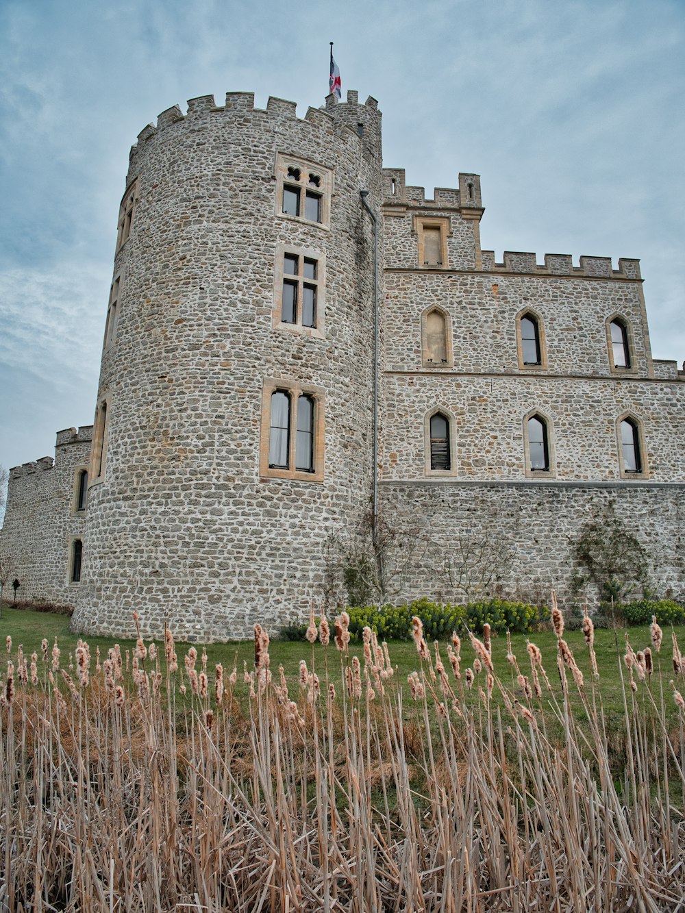 brown brick castle under blue sky during daytime