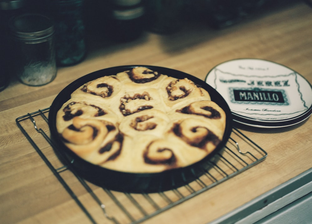 a pie sitting on top of a metal rack