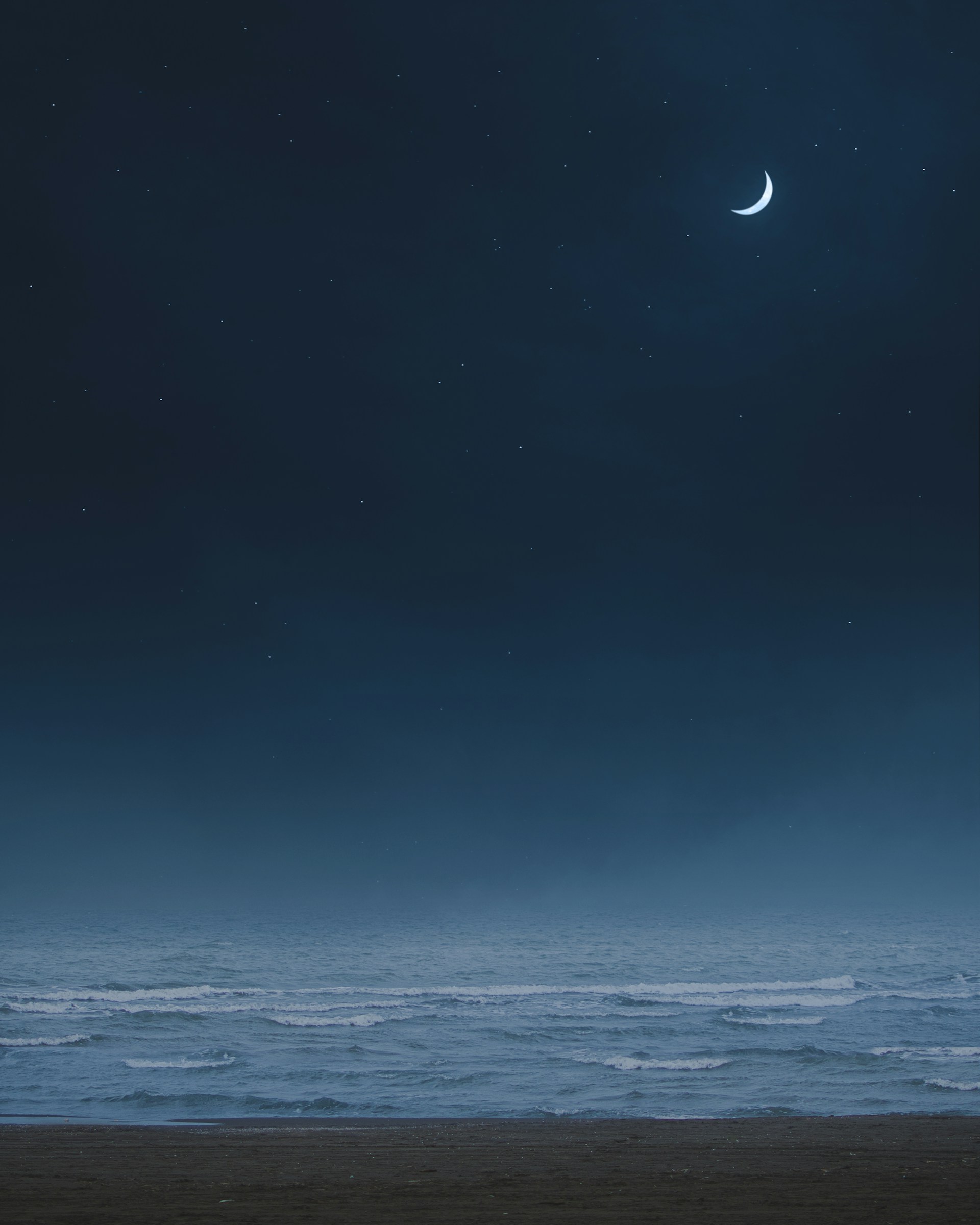 body of water under blue sky during night time