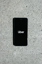 A smartphone displaying the taxi booking app.