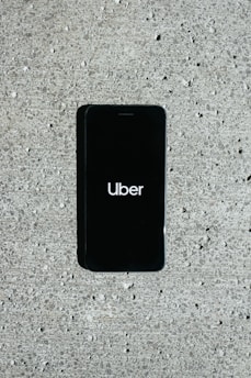 A smartphone displaying the taxi booking app.