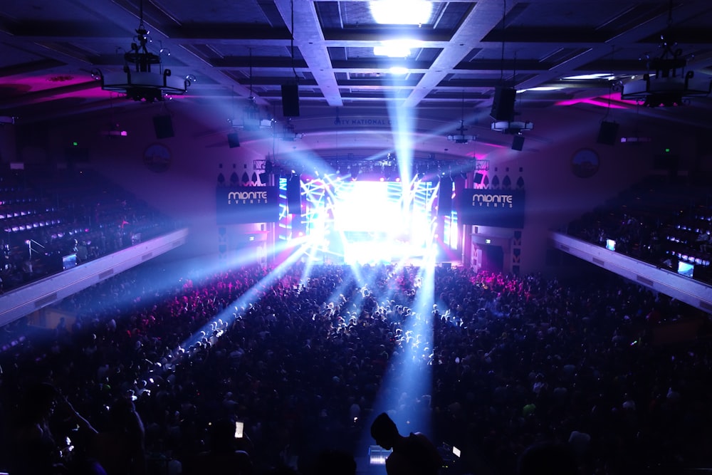 people watching concert during night time