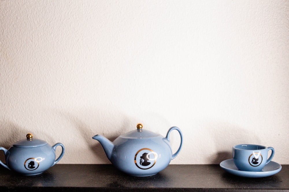 white ceramic teapot on brown wooden table