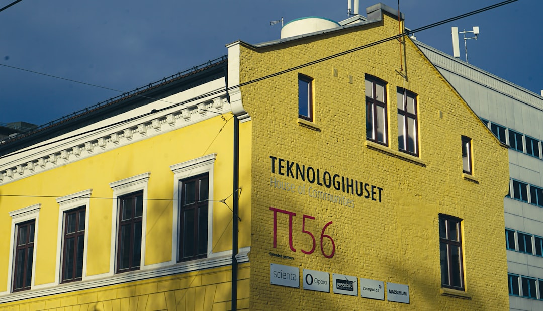 yellow and white concrete building under blue sky during daytime