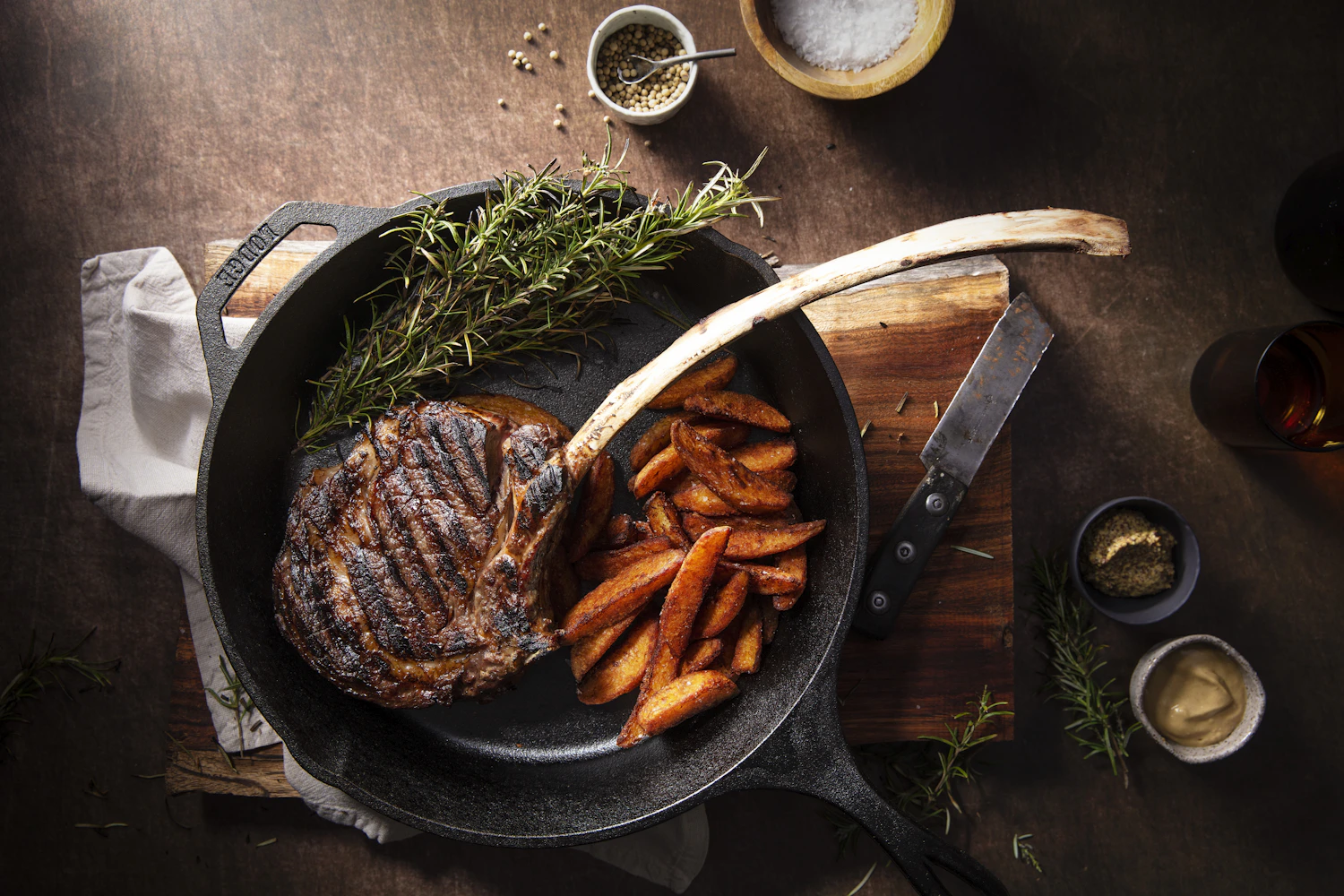 Prime cuts of beef on a dark butcher block