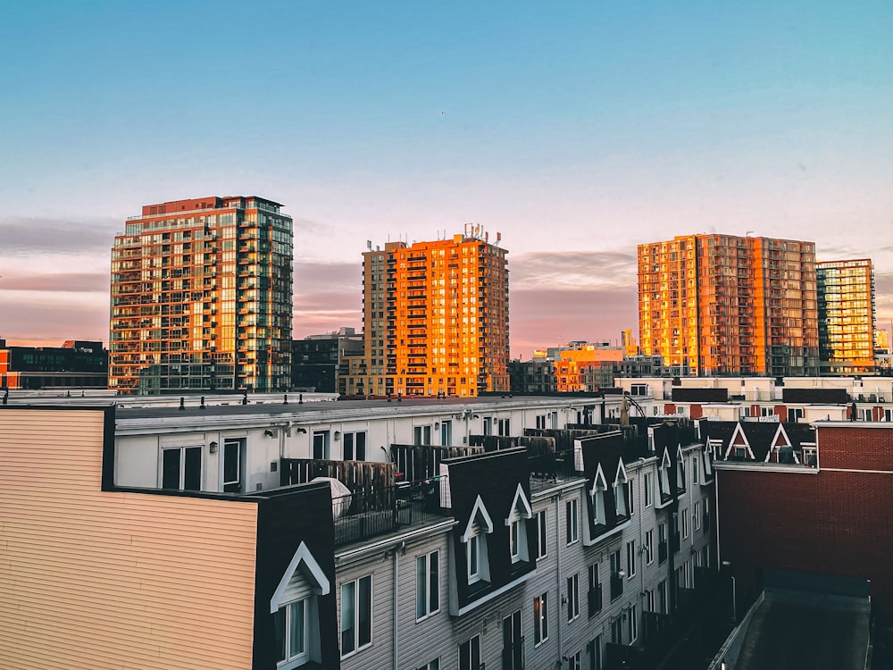 white and brown concrete buildings under blue sky during daytime