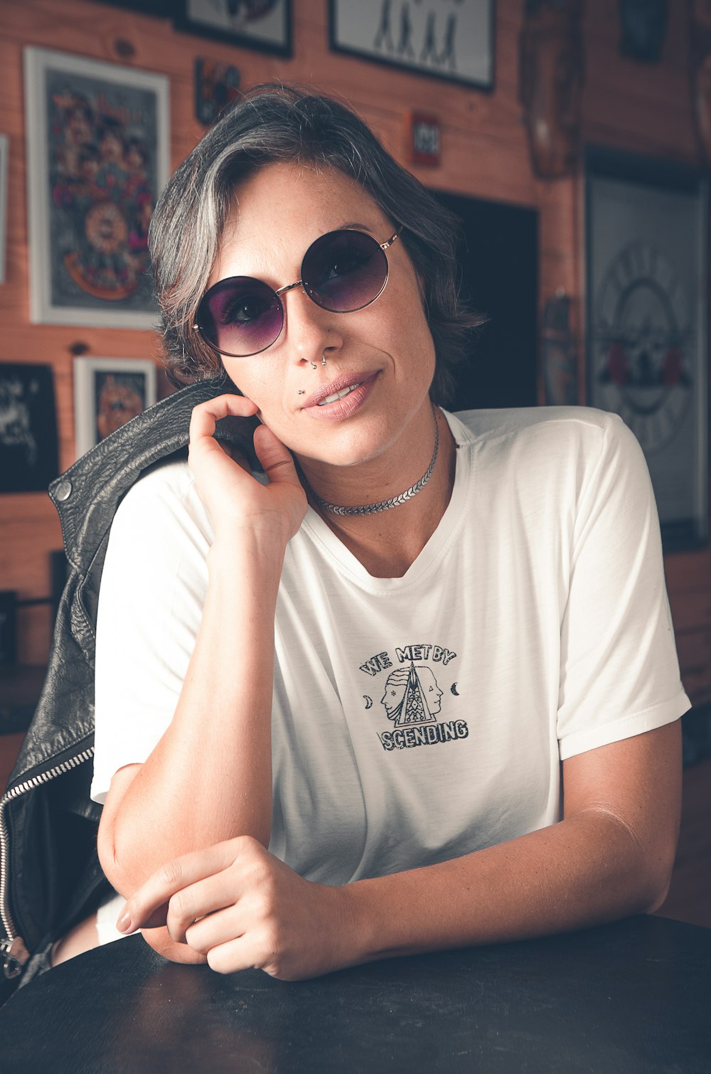 woman in white crew neck t-shirt wearing black sunglasses