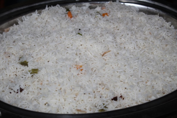 A bowl of cooked rice ready to serve.