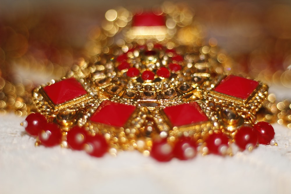 gold and red beaded necklace