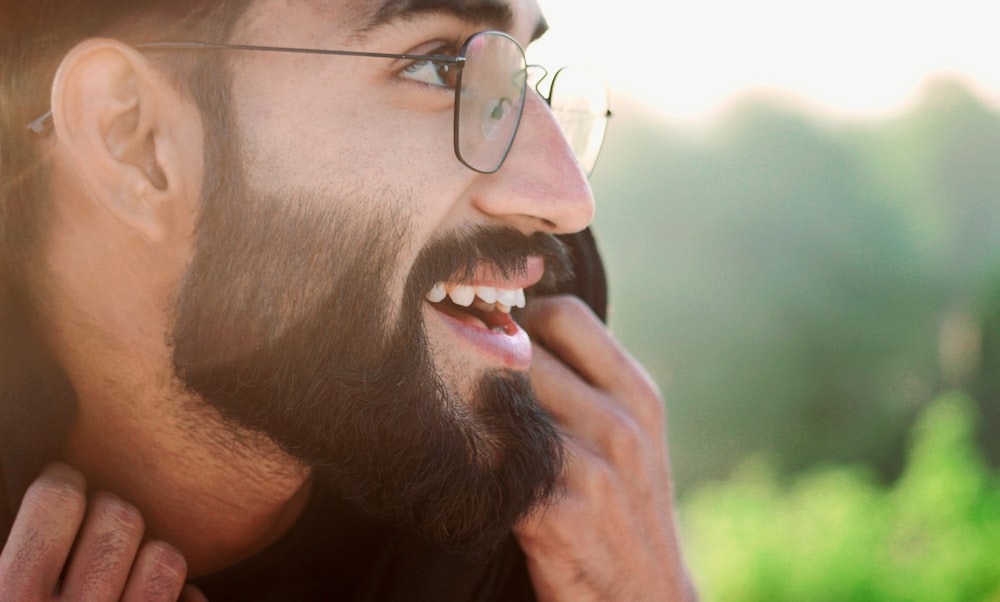 man in silver framed eyeglasses