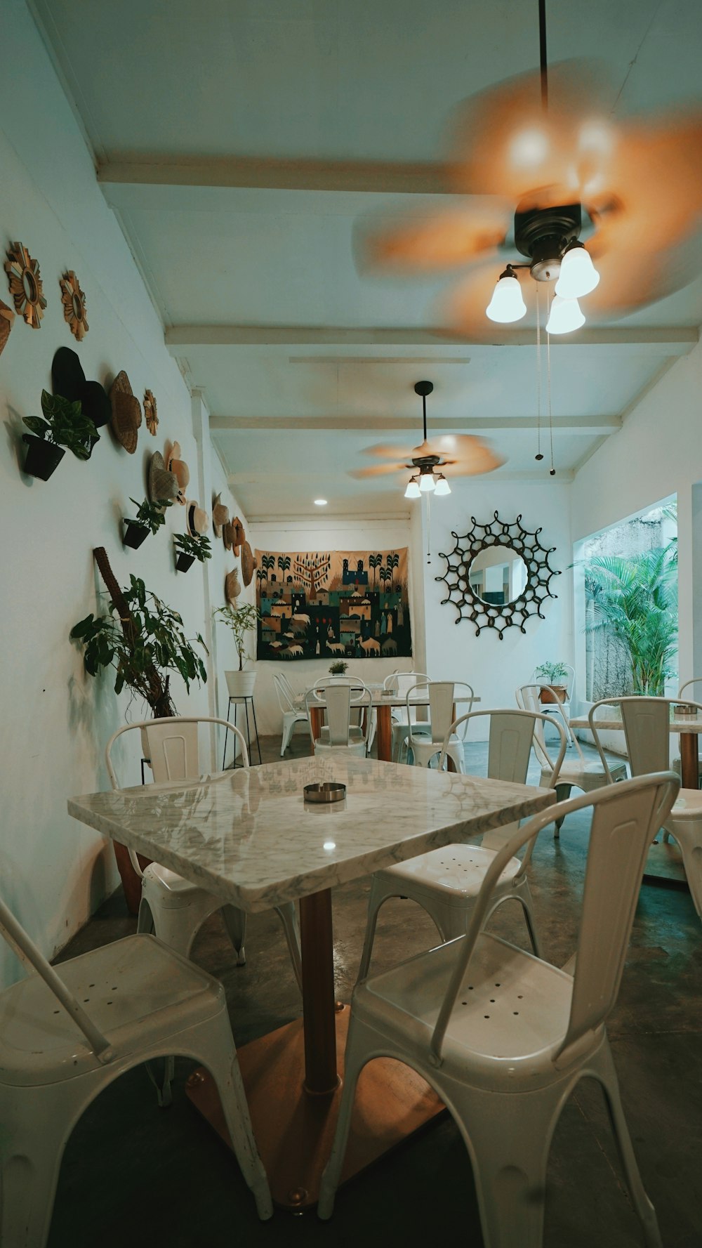 white and brown wooden dining table and chairs