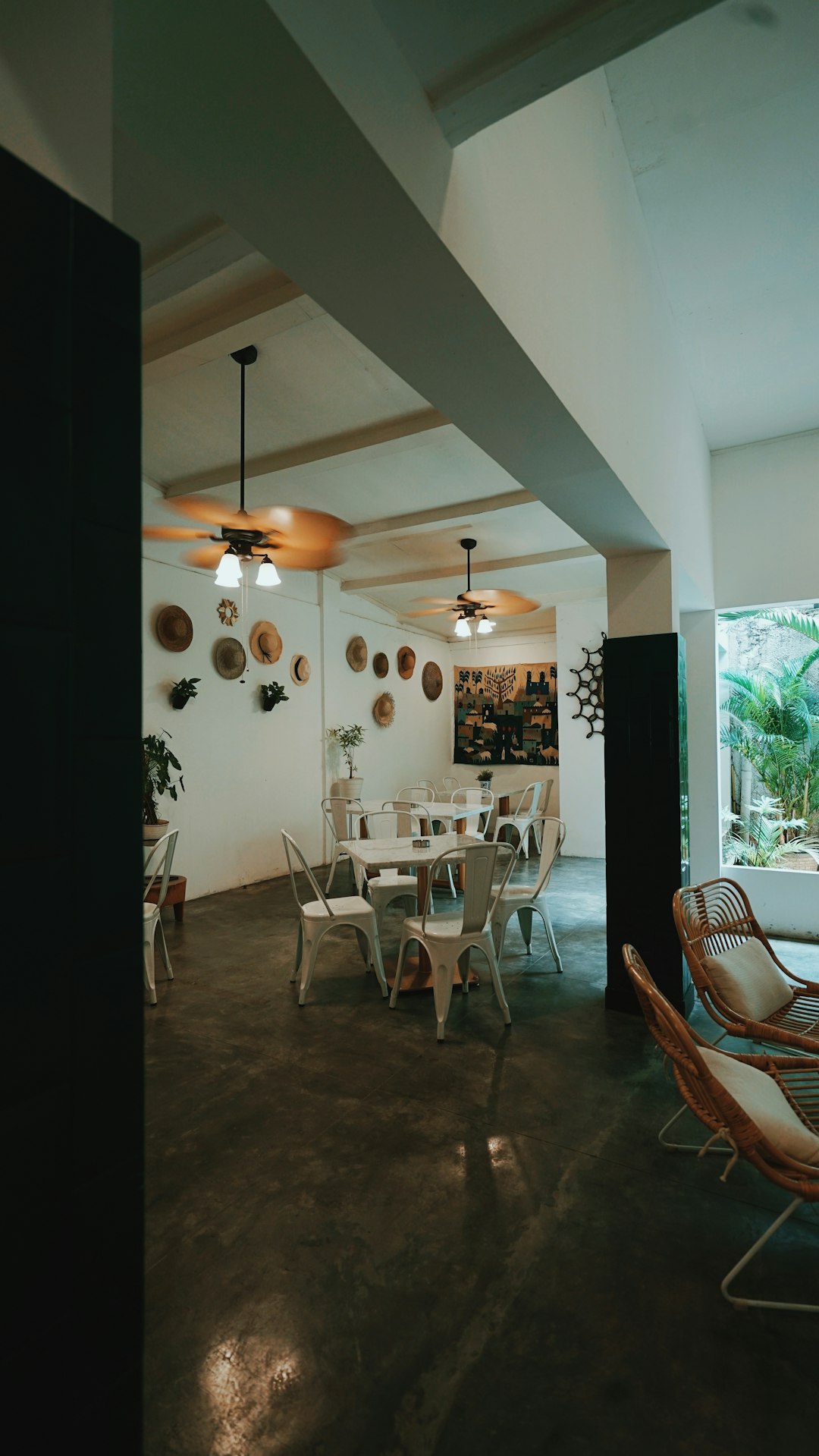 white chairs and table near window