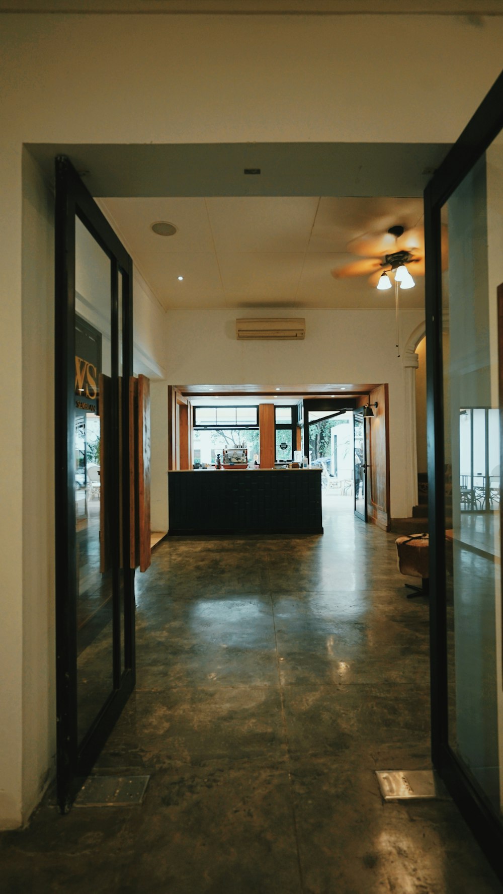 black wooden framed glass door