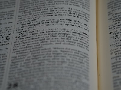 Close-up of hands flipping through the pages of the concise 30-page exam guide.