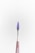 A small tool with a pointed, dark purple tip is centered against a plain light background. The handle is metallic, tapering down towards the tool's sharp end.