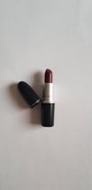 red lipstick on white table
